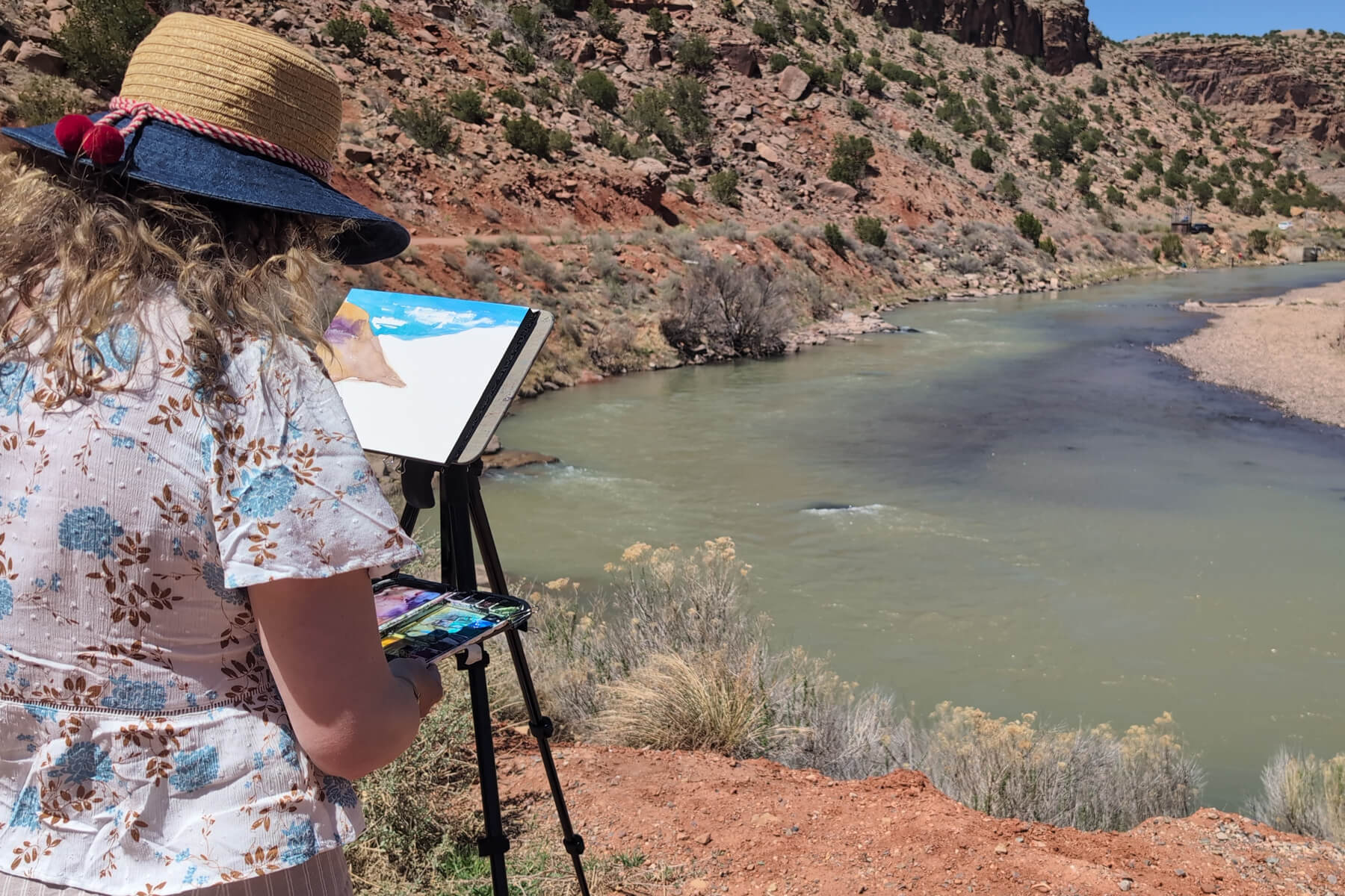 angela working in a canyon